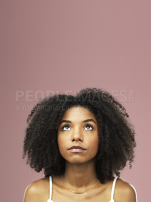Buy stock photo Shot of a beautiful young woman against a pink background