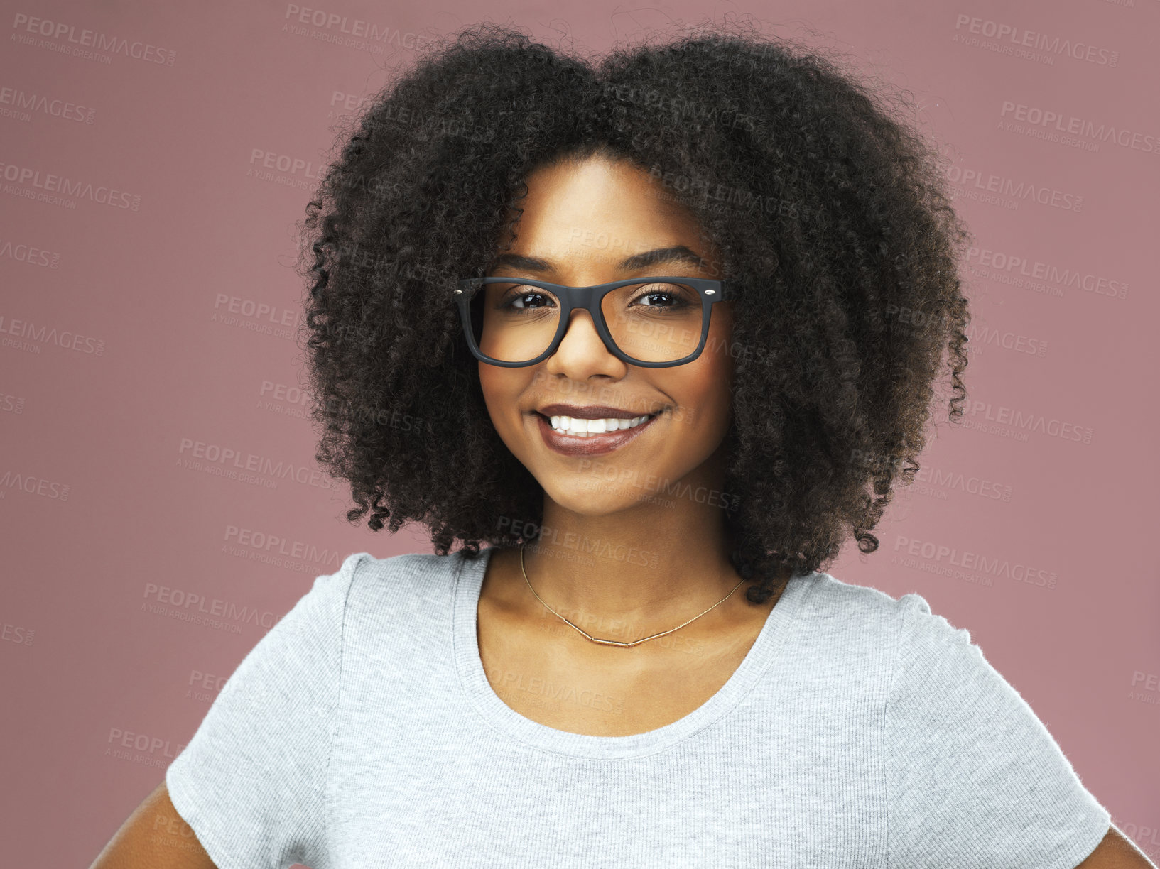 Buy stock photo Black woman, studio and glasses with smile for fashion, confidence and vision for wellness. Female person, pink background and happy in portrait for relax, cheerful in New York City with spectacles