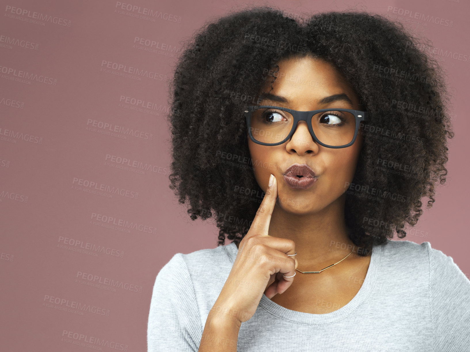 Buy stock photo Black woman, studio and glasses with hand for thinking, idea or goal for future wellness. Female entrepreneur, pink background or planning with bright thought for startup, mockup in New York City