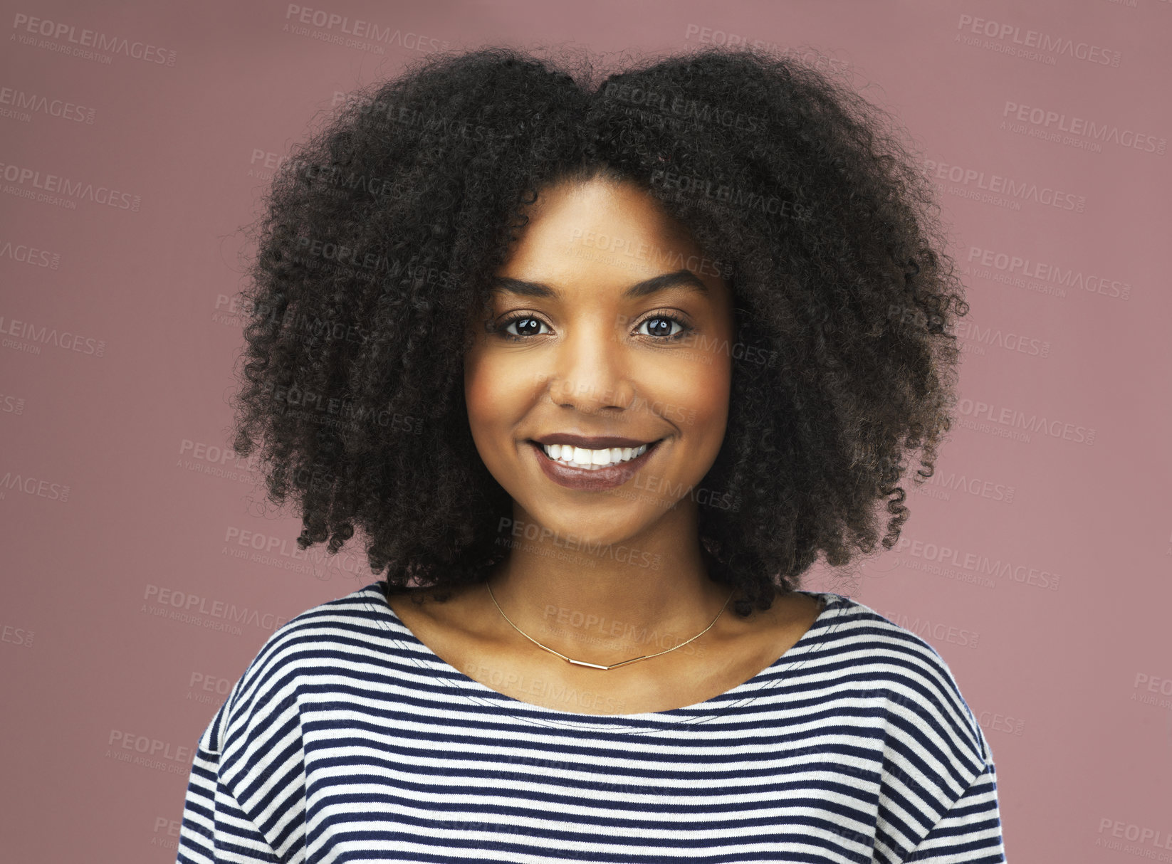 Buy stock photo Afro, haircare and face of black woman, smile and studio for hairstyle, growth and texture of hair. Pink background, portrait and African girl with happiness for treatment in salon and hairdresser