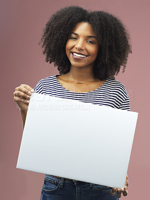 Buy stock photo Paper, poster and portrait of woman in studio for information, news and board for marketing. Female person, mockup and placard with smile for advertising, promotion or announcement on pink background