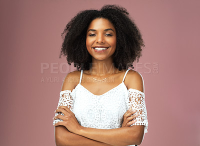 Buy stock photo Afro, fashion and portrait of black woman, confidence and smile for hairstyle, growth or texture. Pink background, arms crossed or African girl with happiness for treatment in studio, beauty or salon