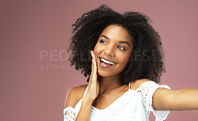 Buy stock photo Happy, smile and selfie with woman in studio for social media, confidence and profile picture. Photo, happiness and relax with portrait of girl on pink background for beauty, self care and influencer