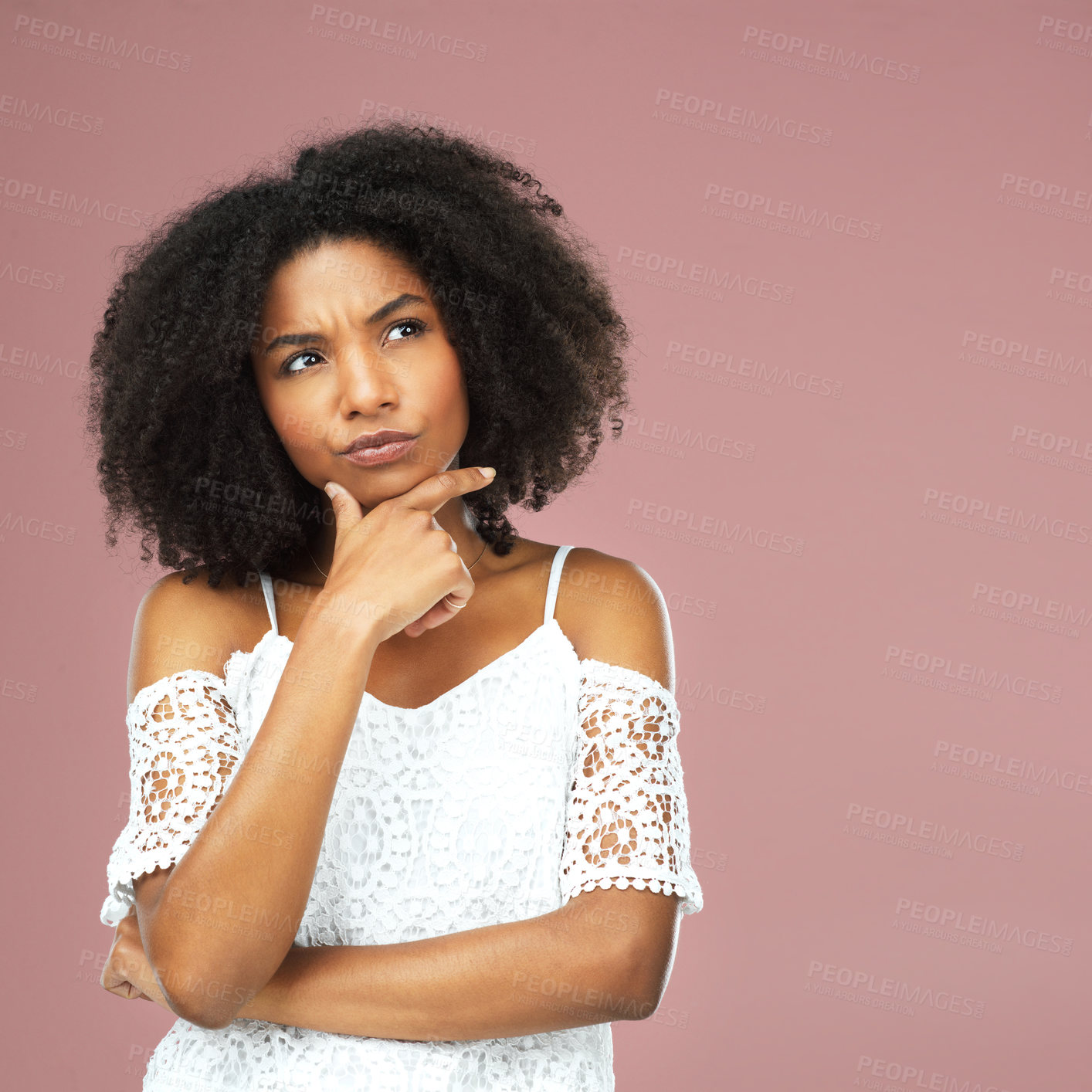 Buy stock photo Confused, black woman and thinking with questions in studio with question, doubt and decision by problem solving for solution. African, female person and thoughtful with choice on pink background