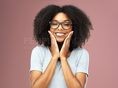 Buy stock photo Studio, excited and black girl with glasses for vision, portrait and Gen z with smile and hands for joy. Afro, African woman and person with eye care with eyewear, pink background and student of USA