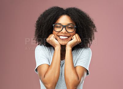 Buy stock photo Studio, joy and black girl with glasses for vision, portrait and Gen z with smile and excited with hands Afro, African woman and person with eye care with eyewear, pink background and student of USA