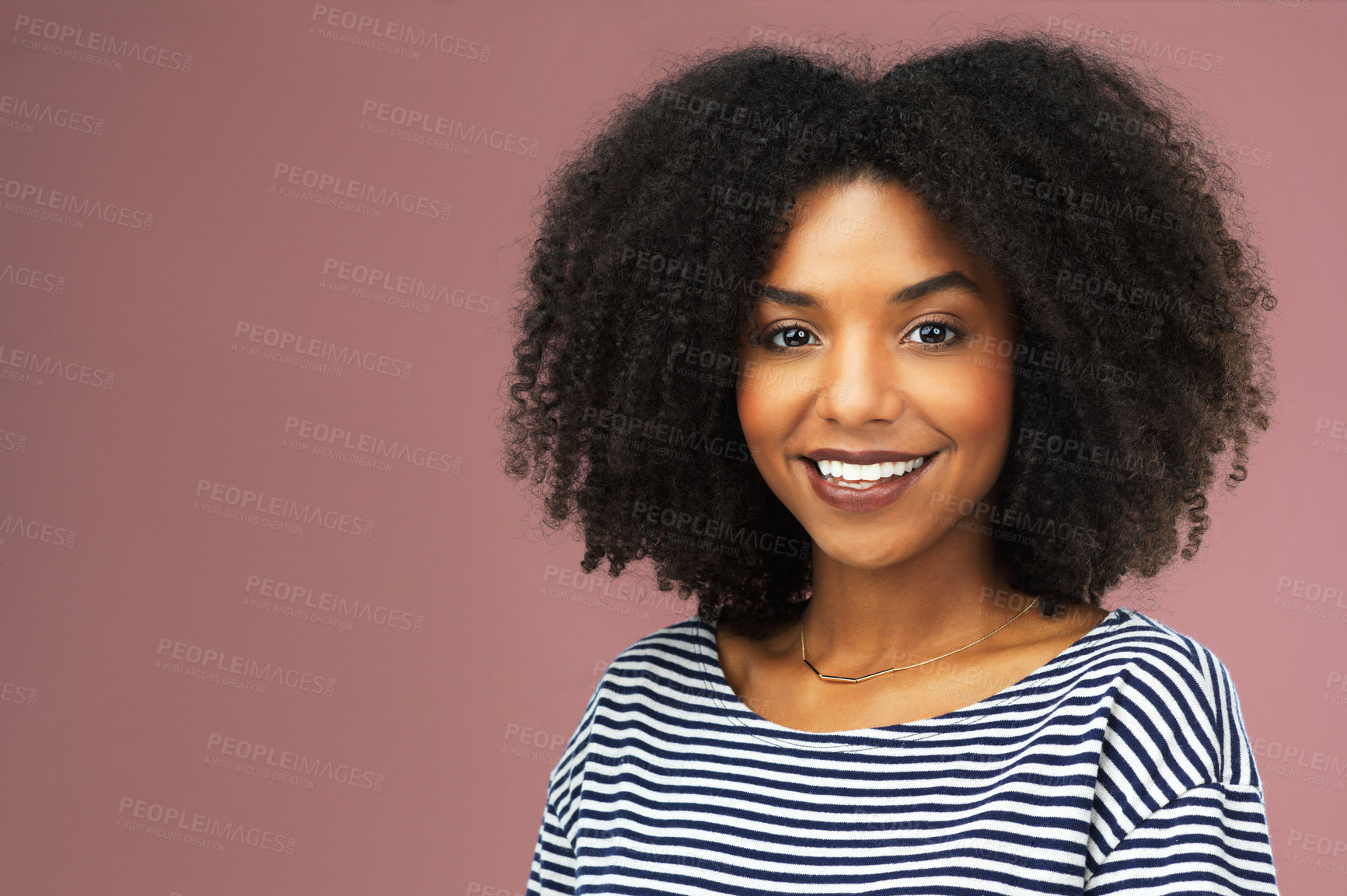 Buy stock photo Shot of a beautiful young woman smiling against a pink background
