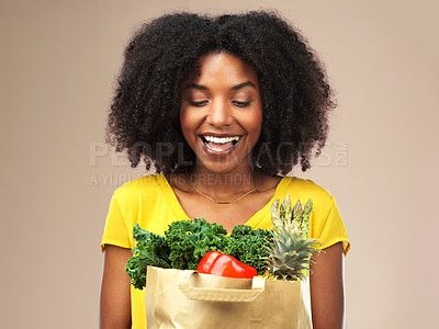 Buy stock photo Smile, health and woman with groceries for diet, wellness and detox with vegetables and fruit. Happy, confident and female person with bag with organic, fresh and nutrition ingredients in studio.