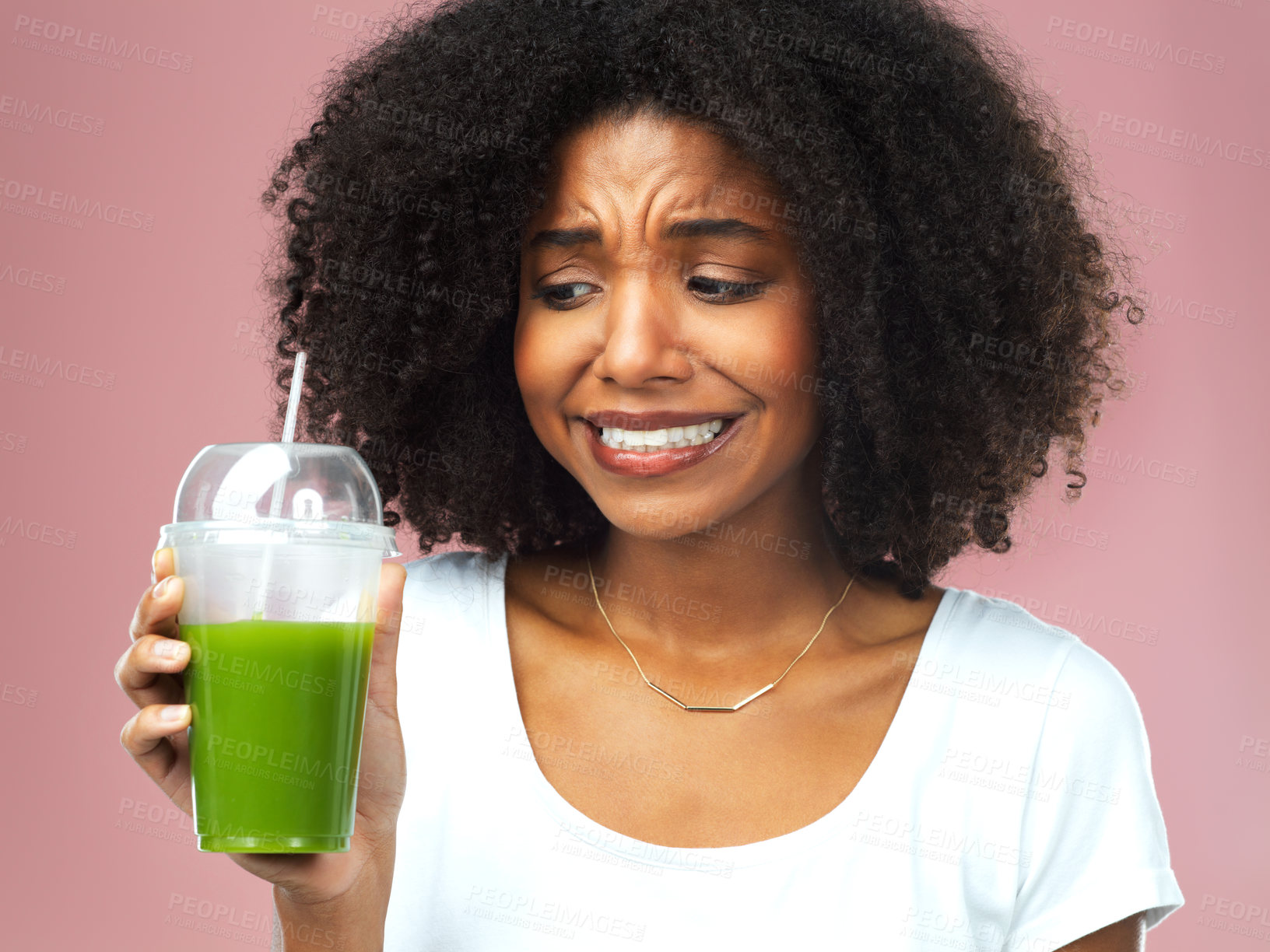 Buy stock photo Disgust, wellness and woman with green juice for detox, nutrition or health weight loss diet. Gross, unhappy and female person drinking organic smoothie for vitamins isolated by studio background.