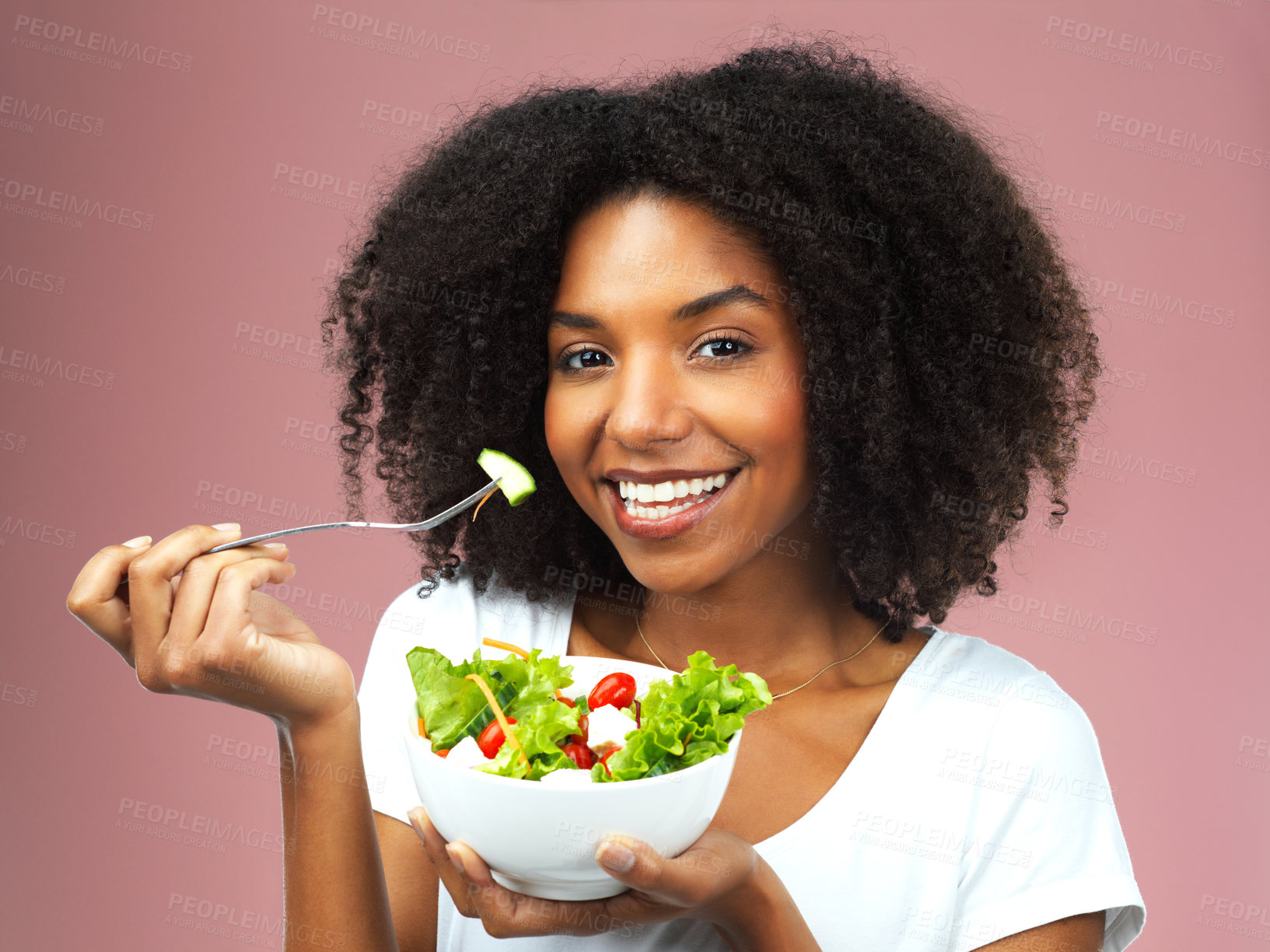 Buy stock photo Smile, eating and portrait of woman with salad for wellness, fresh and detox lunch meal with vegetables. Happy, healthy and person enjoying nutrition, vegan and organic diet food by studio background