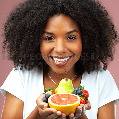 Buy stock photo Black woman, studio and portrait with smile and fruit for fresh nutrition, pure for natural beauty. Female model, pink background or happy for cosmetics with sustainability, vegan makeup for wellness