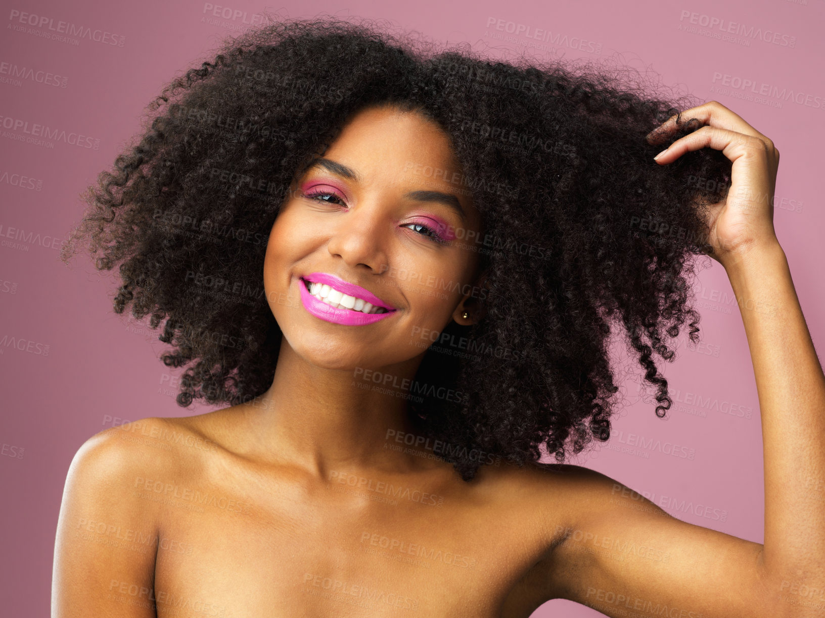 Buy stock photo Face, hair care and smile of black woman with afro in studio isolated on pink background with eyeshadow. Hairstyle portrait, lipstick makeup or African female model with salon treatment for cosmetics