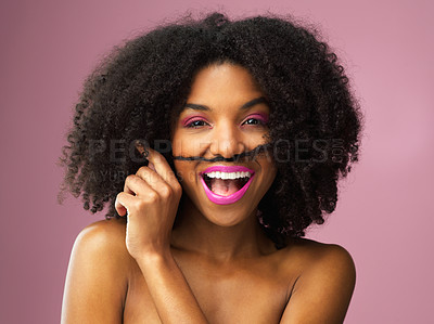 Buy stock photo Studio shot of an attractive young woman posing against a pink background