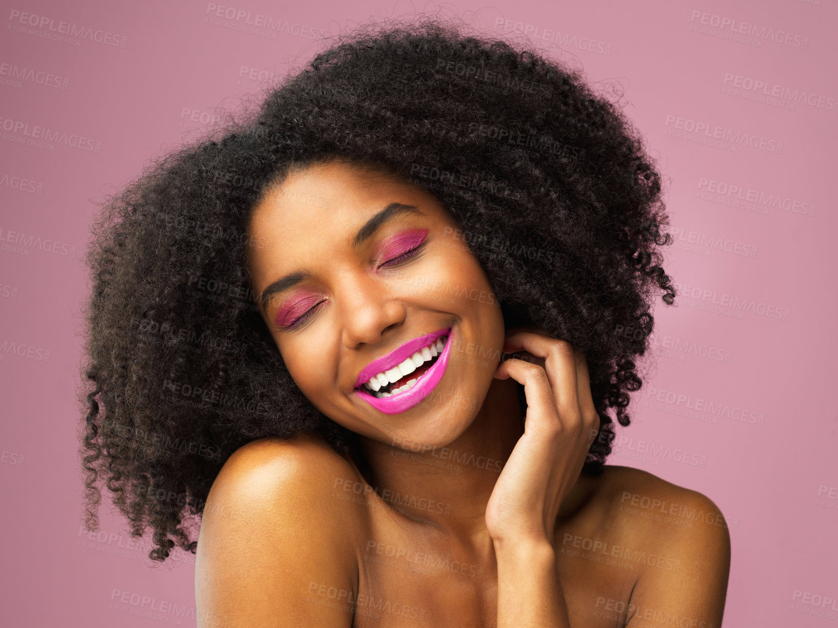 Buy stock photo Black woman, beauty and smile with makeup in studio with cosmetics for skin isolated on pink background. Happy, lips and mascara with cosmetology, attractive and cool flawless face in the Netherlands