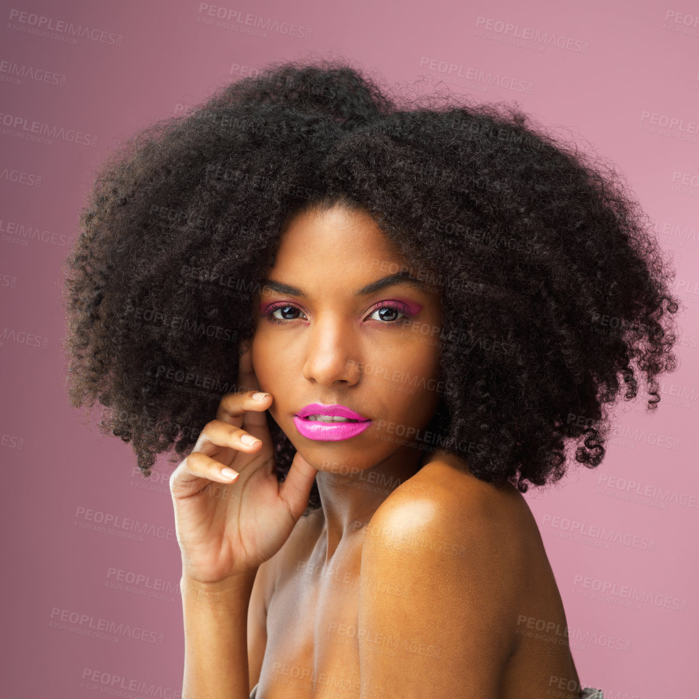 Buy stock photo Face, hair care and serious black woman with makeup in studio isolated on a pink background for skincare. Hairstyle portrait, cosmetics and African female model with salon treatment for afro beauty.