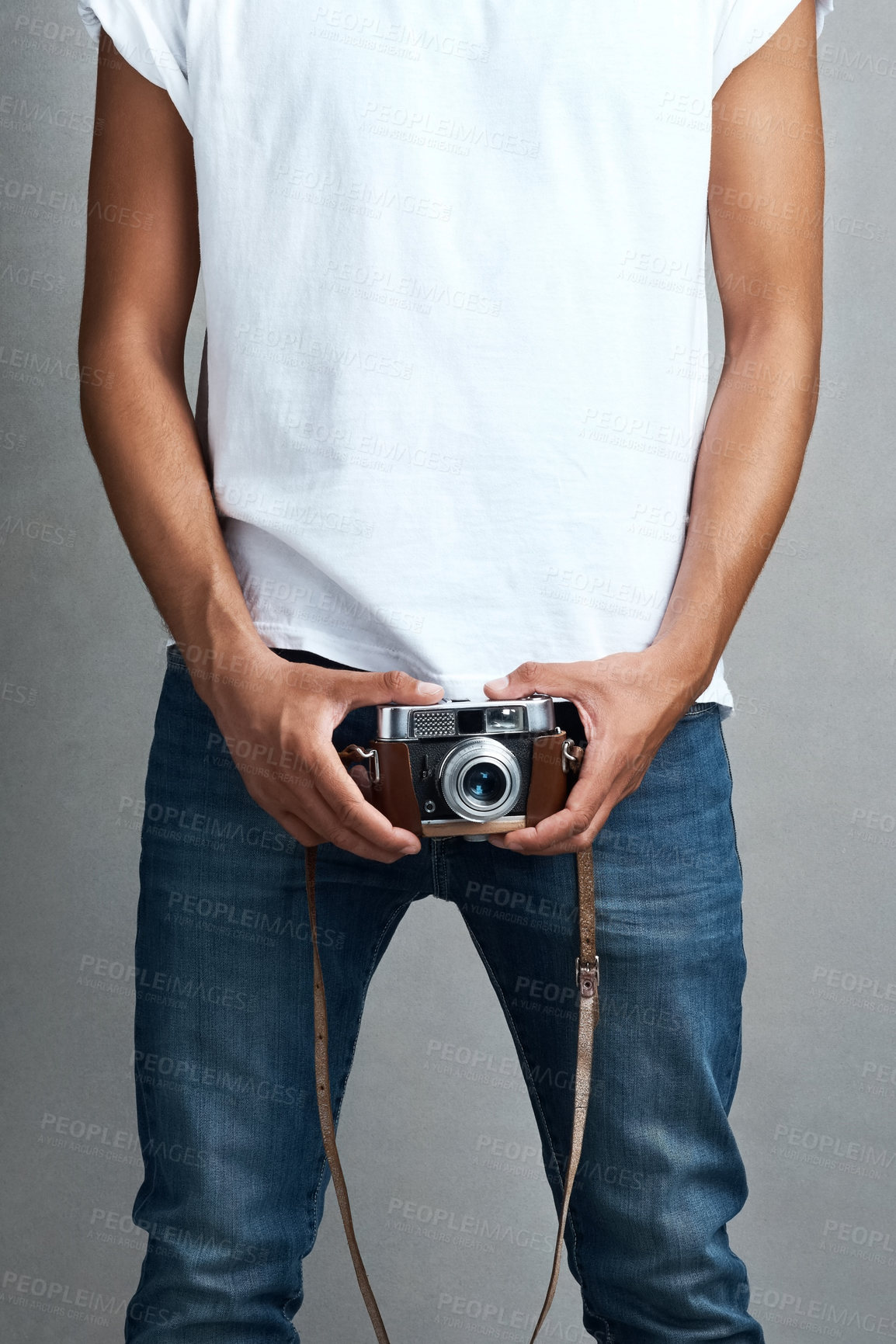 Buy stock photo Camera, photography and hands of man in studio for digital media, photoshoot and production. Body, photographer and lens with vintage equipment for creative, art and documentation on gray background