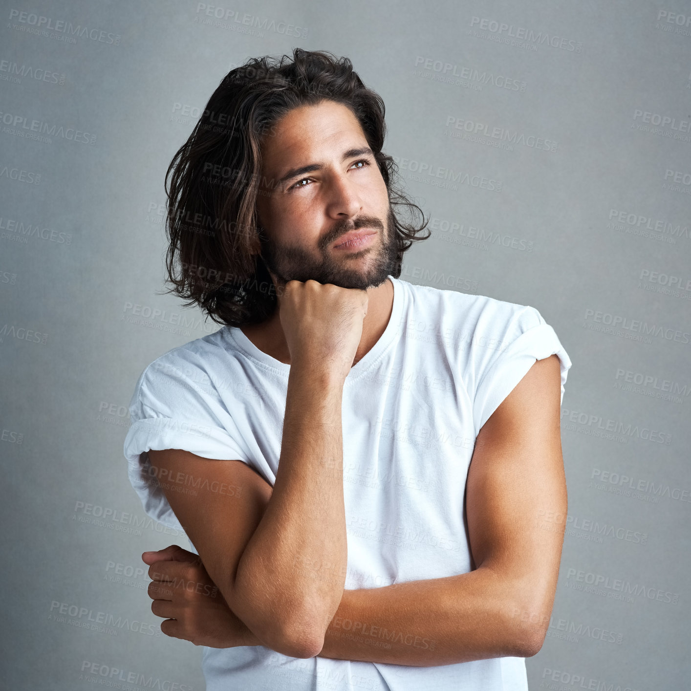 Buy stock photo Thinking, man and hand on chin in studio for remember, solution or inspiration on gray background. Relax, wonder and male model  with decision for daydreaming, memory or wondering about future