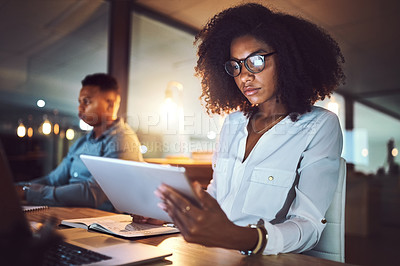 Buy stock photo Tablet, reading and business woman in office at night with stock market analysis for risk management. Digital technology, research and African female financial broker with foreign exchange trading.