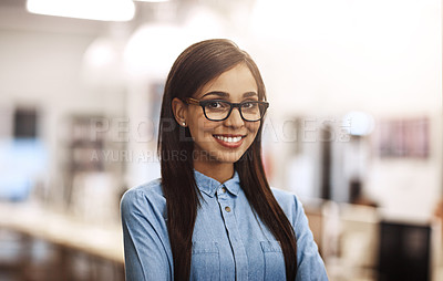 Buy stock photo Portrait of a university student standing in the library at campus