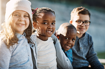 Buy stock photo Cropped portrait of a group of elementary school kids smiling outside
