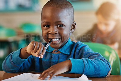 Buy stock photo Cropped portrait of an elementary school boy in the classroom