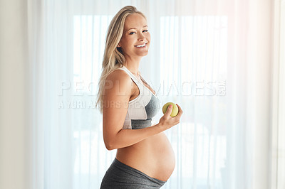 Buy stock photo Pregnancy, woman and apple portrait in home, maternity and healthy diet for fetal nutrition. Pregnant development, prenatal snack and fiber for gestation, obstetrician recommendation for wellness