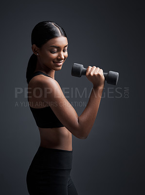 Buy stock photo Indian woman, dumbbells and smile for fitness in studio for training on black background, lose weight or mockup. Female person, weightlifting and gym confidence or bicep muscle, wellness or challenge