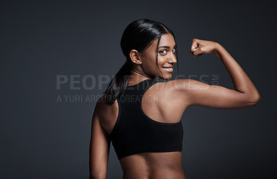 Buy stock photo Portrait, happy and woman flexing back in studio isolated on a black background mockup. Strong flex, smile and Indian female athlete with bicep, arm strength or bodybuilder muscle, fitness or workout