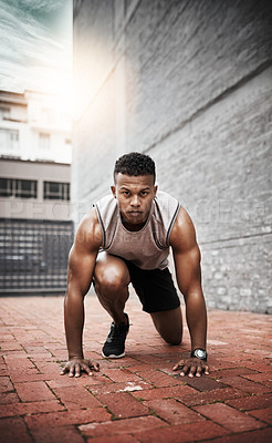 Buy stock photo Portrait of a sporty young man exercising outdoors