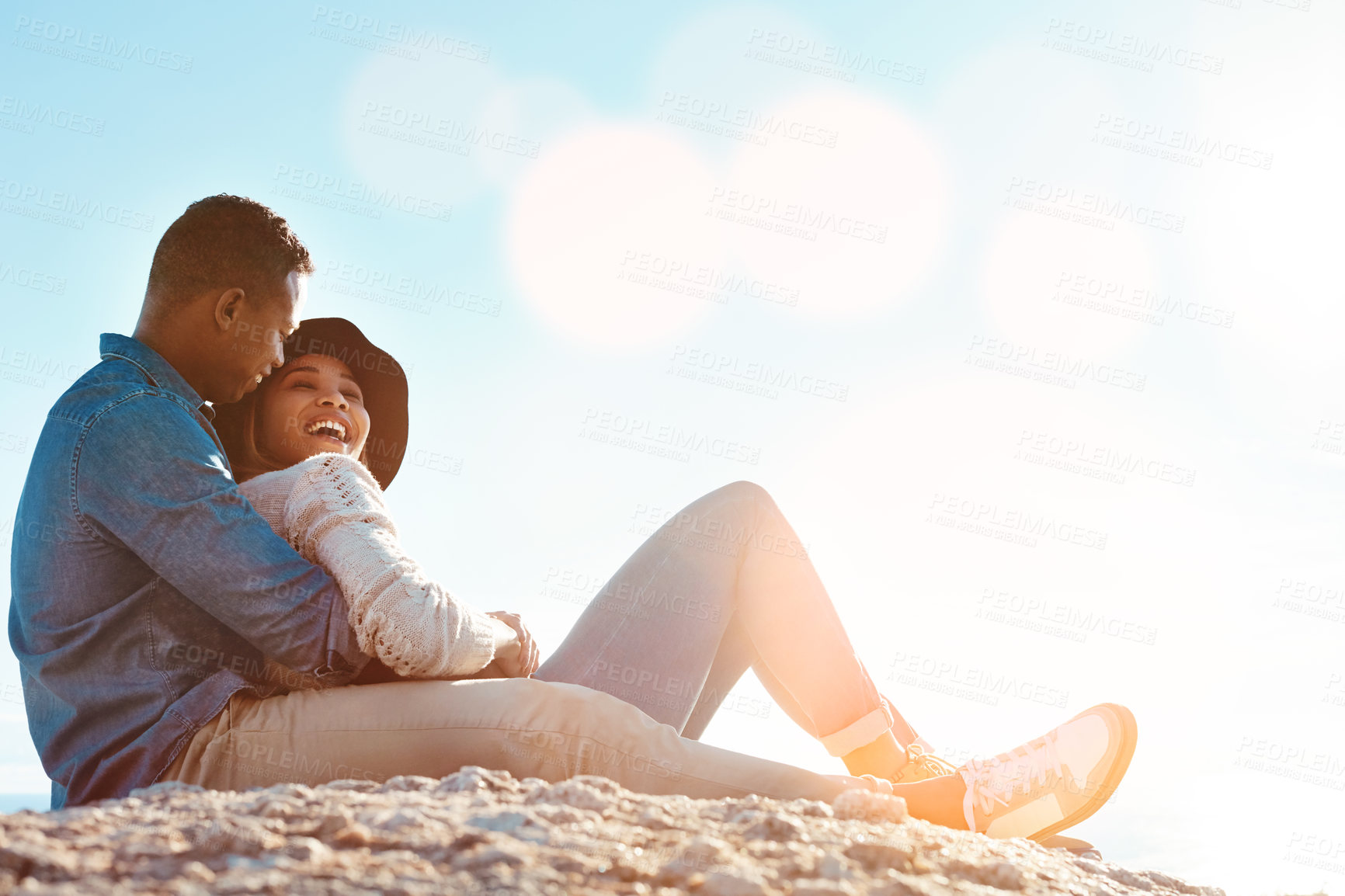 Buy stock photo Outdoor, hug and couple with love, discussion and bonding together for happiness, care and vacation. Nature, bokeh or man with woman, embrace or conversation for summer holiday, relax or relationship