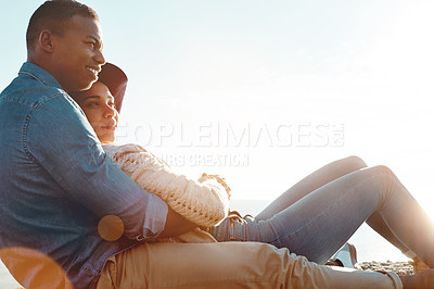 Buy stock photo Shot of a happy young couple enjoying a romantic day outdoors