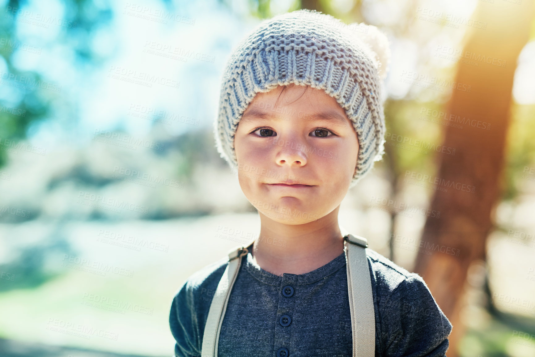 Buy stock photo Portrait of an adorable little boy playing outside