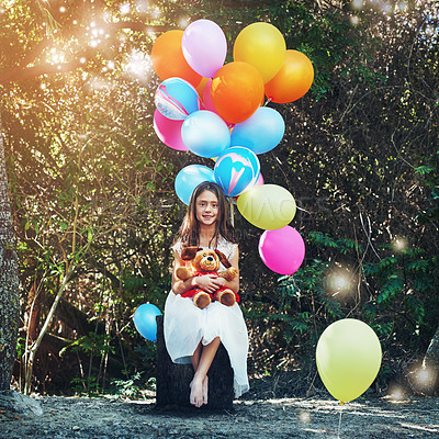 Buy stock photo Portrait of a little girl playing with a teddybear and bunch of balloons outside