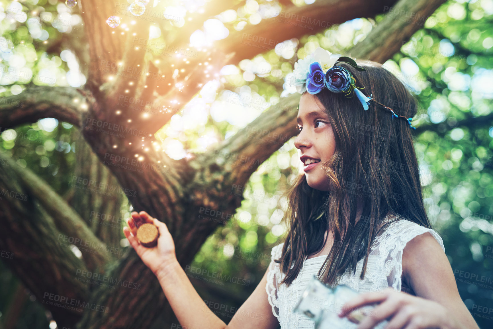 Buy stock photo Shot of a little girl catching fireflies in a jar outside