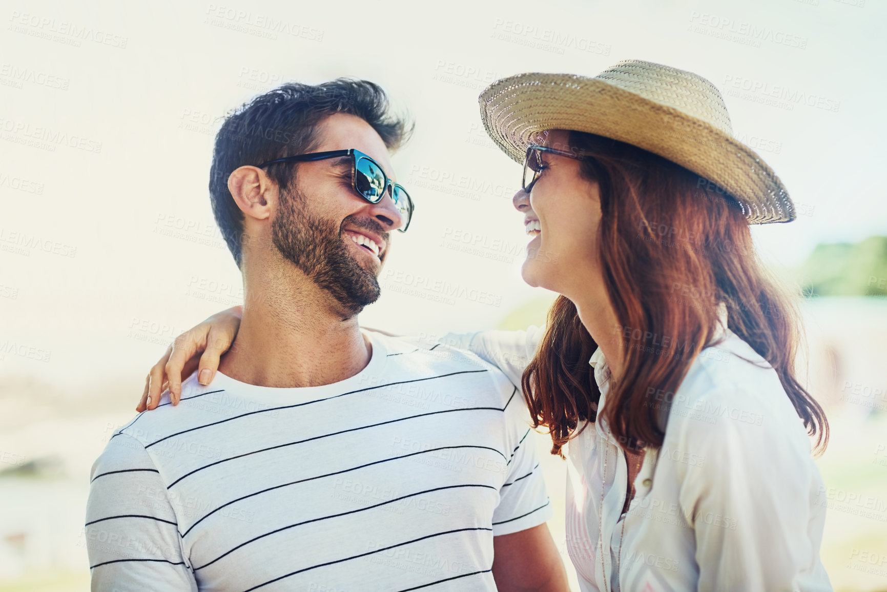 Buy stock photo Couple, people and laugh on hug in outdoor with sunglasses for summer holiday, relax and fun in Spain. Relationship, love and happy with support on vacation, trip and travel together as soulmate