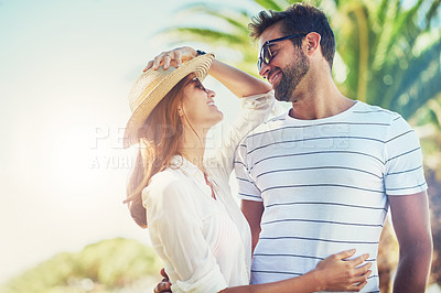 Buy stock photo Couple, people and happy on hug in outdoor with sunglasses for summer holiday, relax and fun in Spain. Relationship, love and smile with support on vacation, trip and travel together as soulmate