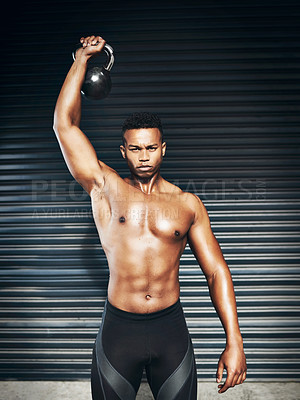 Buy stock photo Portrait of a muscular young man lifting weights against a grey background