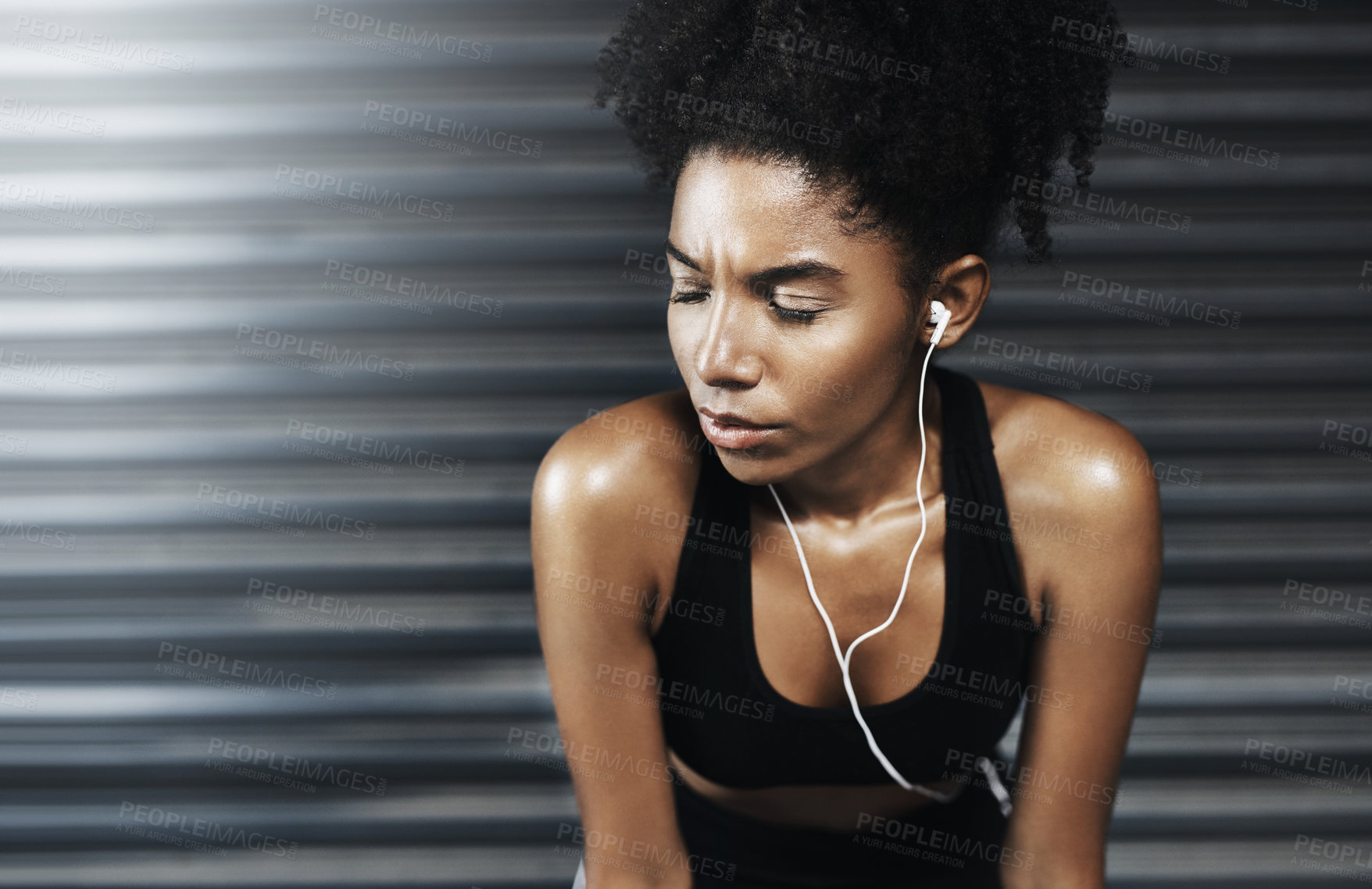 Buy stock photo Rest, thinking and woman with earphones in gym with music for workout, training and exercise. Sports center, fitness and person listening to audio, playlist and radio for health, wellness and break