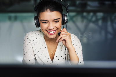 Buy stock photo Cropped shot of an attractive young businesswoman working late in a call center