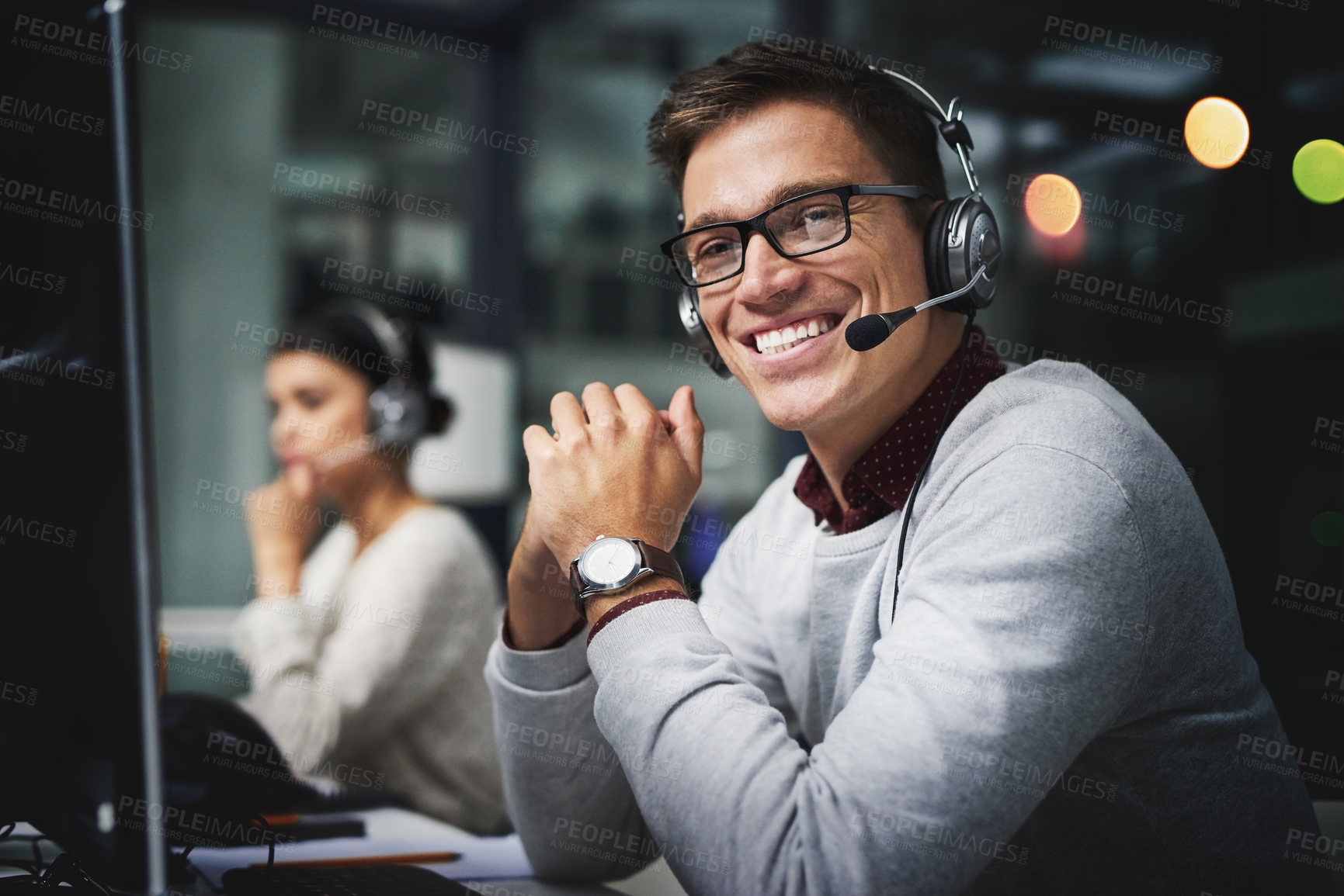 Buy stock photo Call center, man and portrait with microphone for customer service with communication and FAQ support. Telemarketing, agent or happy with telecom advisory, contact us and headphones for help at night