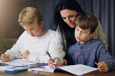 Buy stock photo Mother, children and helping with school homework in house or learning education, teaching or lesson. Woman, sons and table in apartment for student knowledge or academic studying, writing or project
