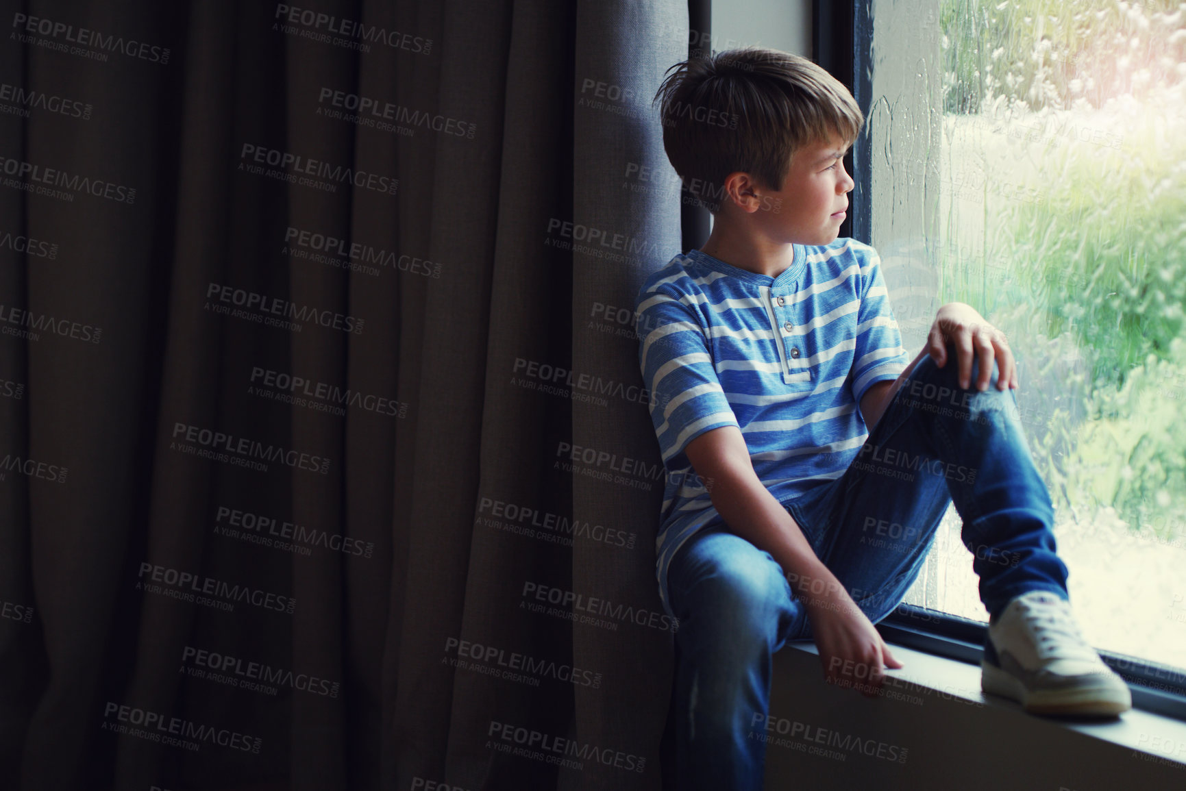Buy stock photo Boy child, rain and thinking by window with sad face, mental health and mockup space in home. Male kid, raining and think by glass with depression, mock up or fear with problem, winter and frustrated