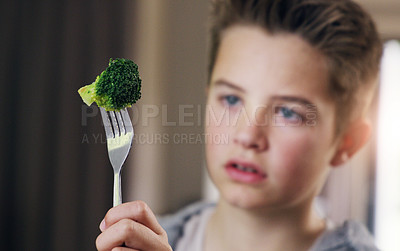 Buy stock photo Disgust, food and refuse with child and broccoli for nutrition, health and cooking. Sad, angry and dinner with boy and green vegetable on fork at home for eating problem, frustrated and dislike