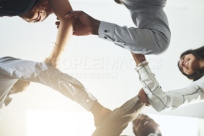 Buy stock photo Office, collaboration and business people with arms linked for teamwork, support and unity at company. Low angle, employees and happy with gesture of help for partnership, solidarity and motivation