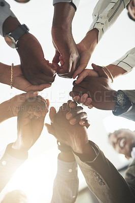 Buy stock photo Closeup shot of a group of businesspeople holding hands