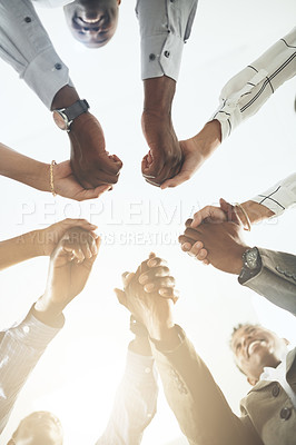 Buy stock photo Closeup shot of a group of businesspeople holding hands