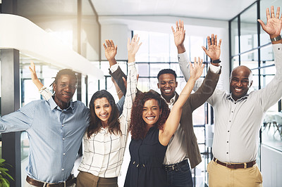 Buy stock photo Portrait of a group of businesspeople cheering in an office