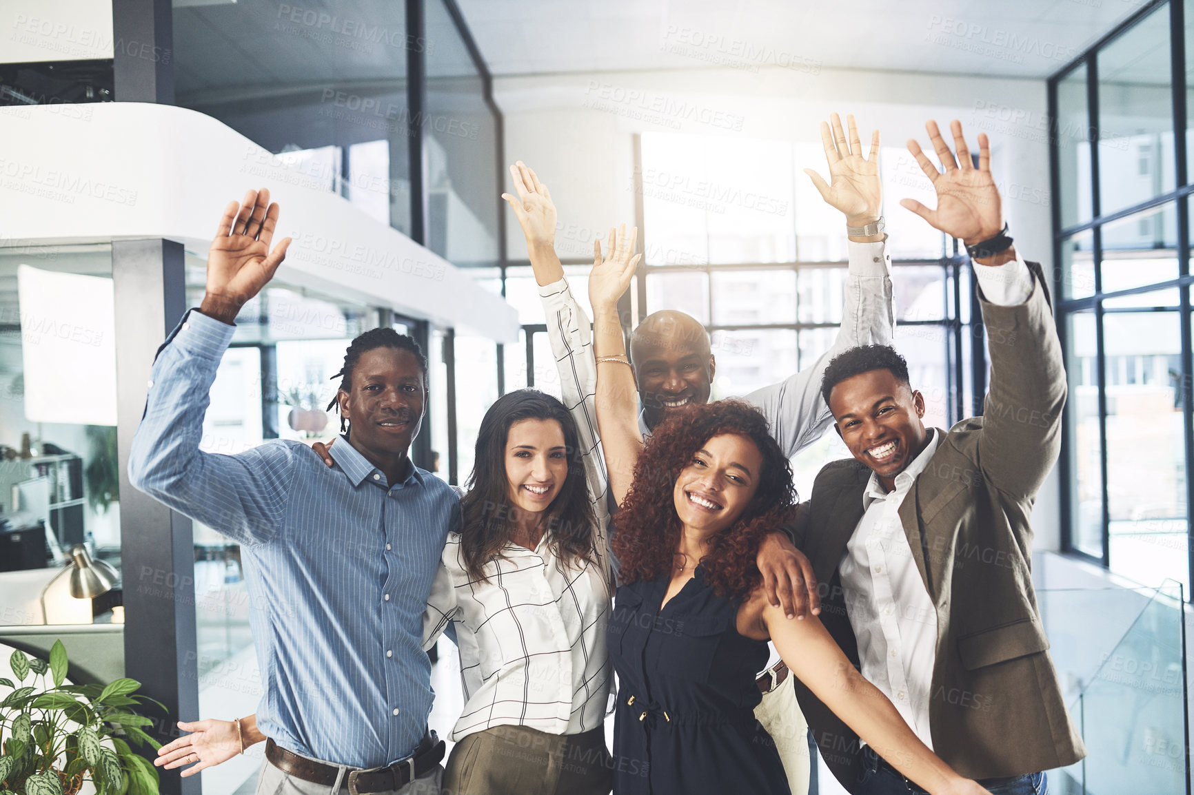 Buy stock photo Portrait of a group of businesspeople cheering in an office