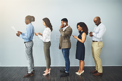 Buy stock photo Office, technology and row of business people for hiring, recruitment or patience for corporate career. Diversity, men and women as candidates with smartphone, document or waiting queue for interview