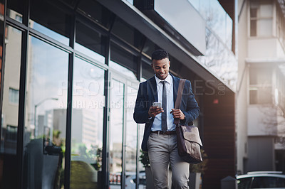 Buy stock photo Black man, cellphone and business or travel career with online networking as real estate agent, digital app or smile. Male person, briefcase and client deal in downtown Atlanta, street or commute